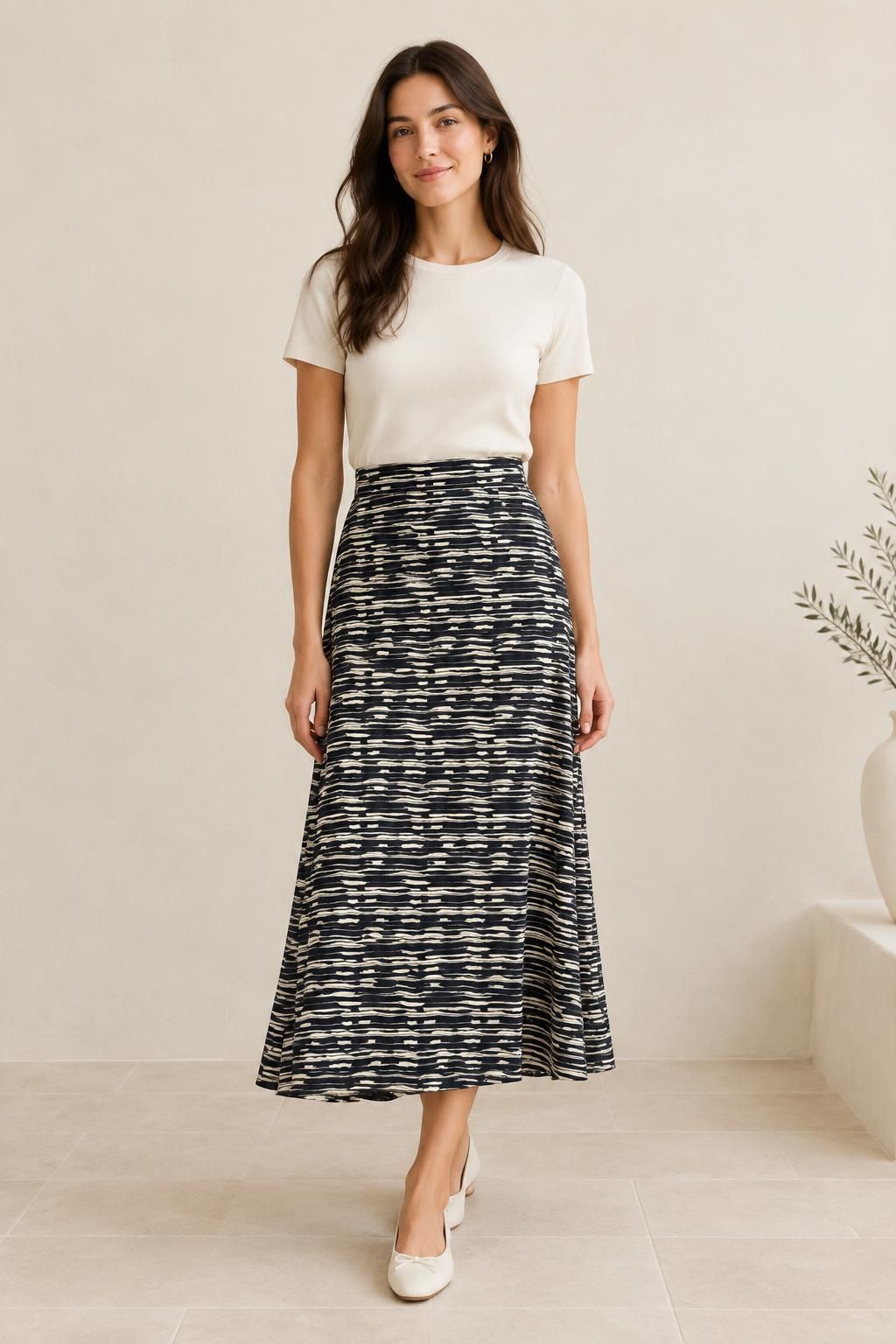 The skirt inspiration using Fluid viscose with graphic black and ecru stripes fabric