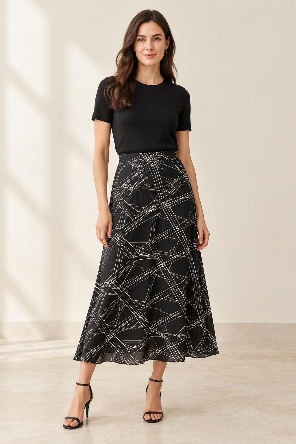 Inspiration La jupe avec le tissu Crêpe de polyester léger, motif géométrique noir et blanc