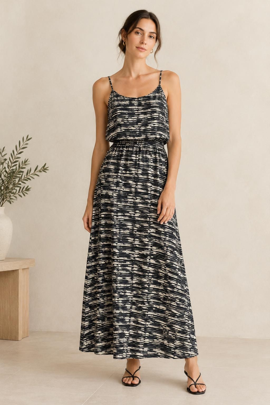 The dress inspiration using Fluid viscose with graphic black and ecru stripes fabric